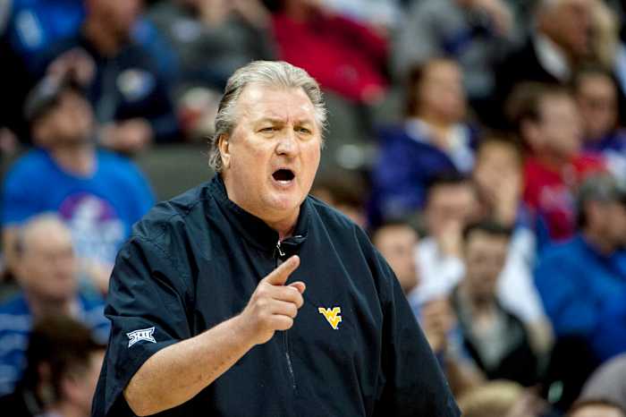 West Virginia Mountaineers head coach Bob Huggins yells during the first half against the Kansas Jayhawks in the semifinals of the Big 12 conference tournament at Sprint Center.